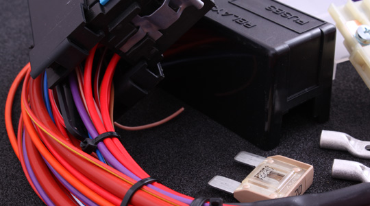 Complete relay / fuse box with pre-mounted wires to easy-up a flying lead installation